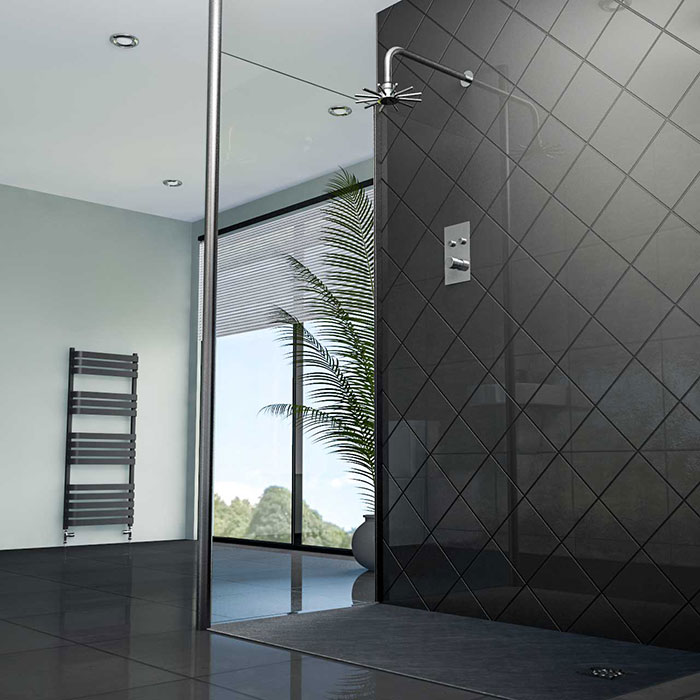 Walk in shower with black tiles and feature wall of Dulux Tranquil Dawn