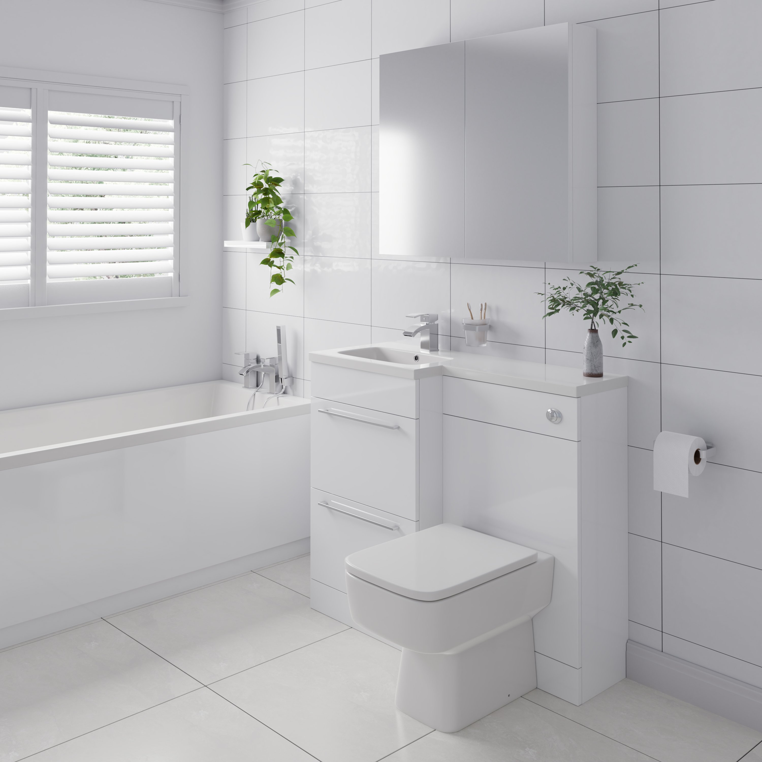 White bathroom suite with combination vanity unit and toilet and standard straight bath.