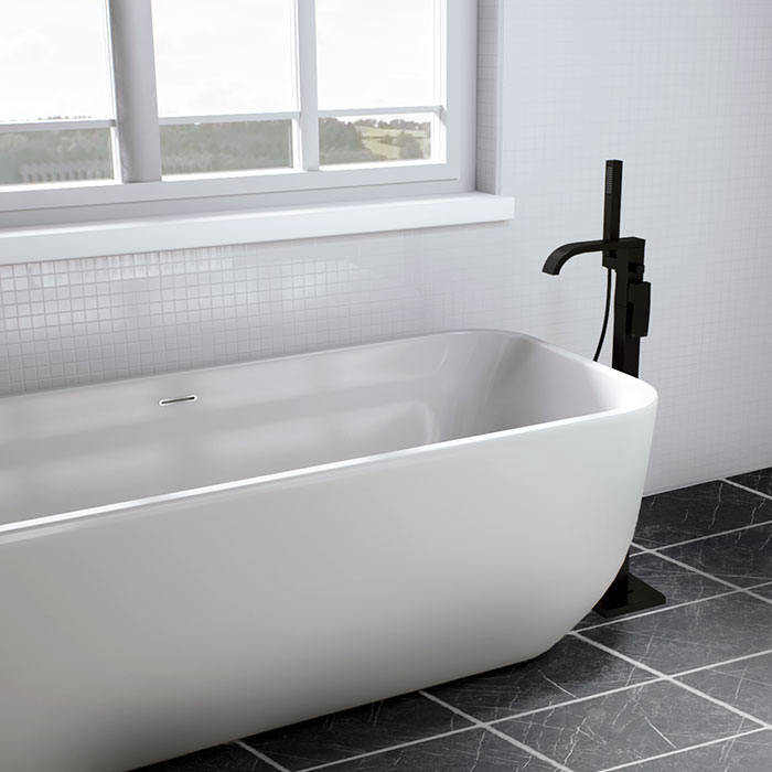 Black taps- black freestanding bath shower mixer tap on white freestanding bath