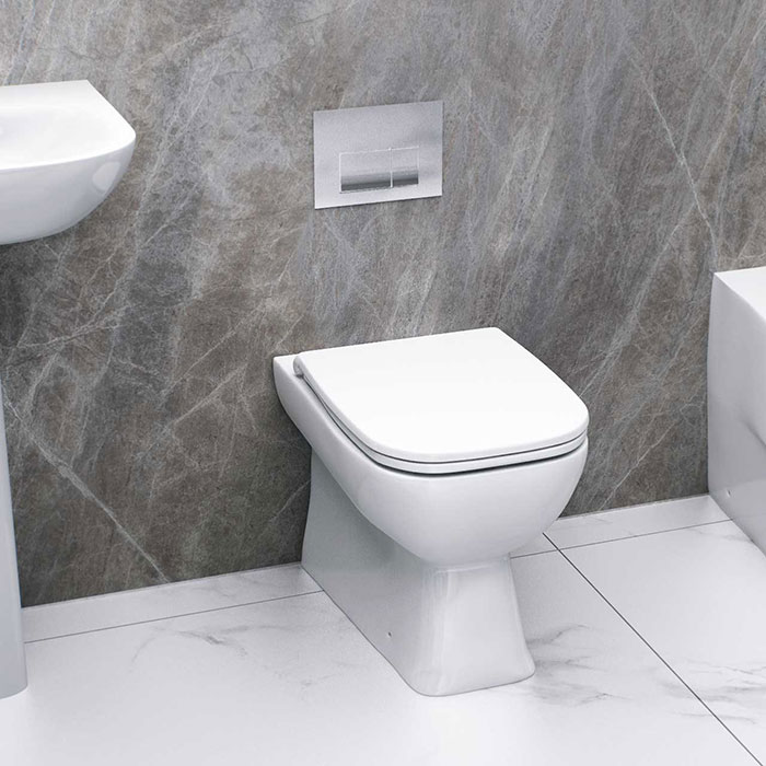 Easy clean bathroom with back to wall toilet