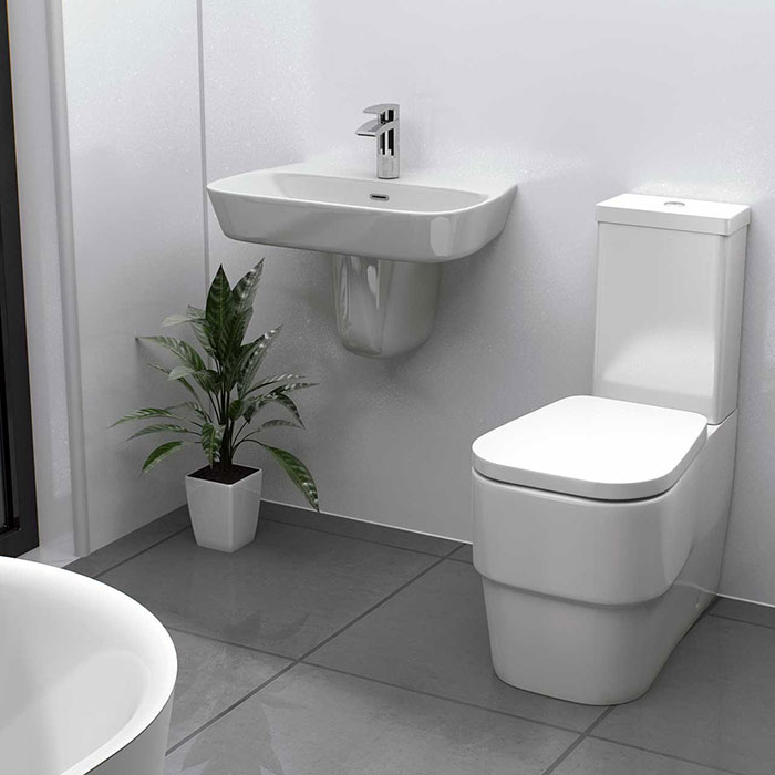 Easy clean bathroom with wall hung, semi pedestal basin and close coupled toilet