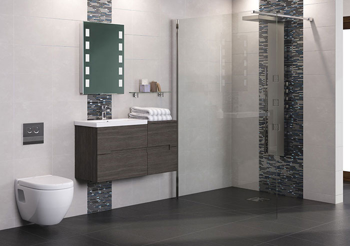 Minimalist modern bathroom with wall hung unit and walk in shower enclosure 
