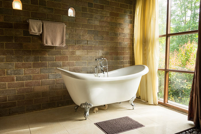 rustic bathroom-exposed brick