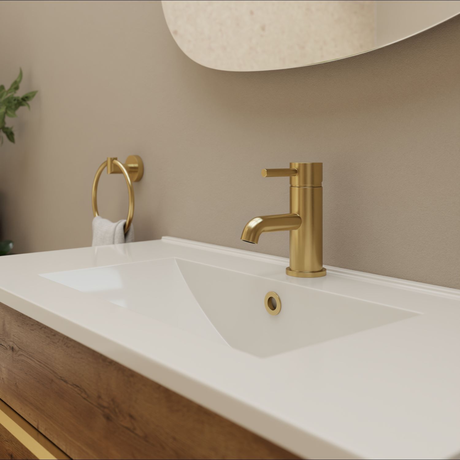 woodgrain vanity unit with brushed brass tap and towel holder