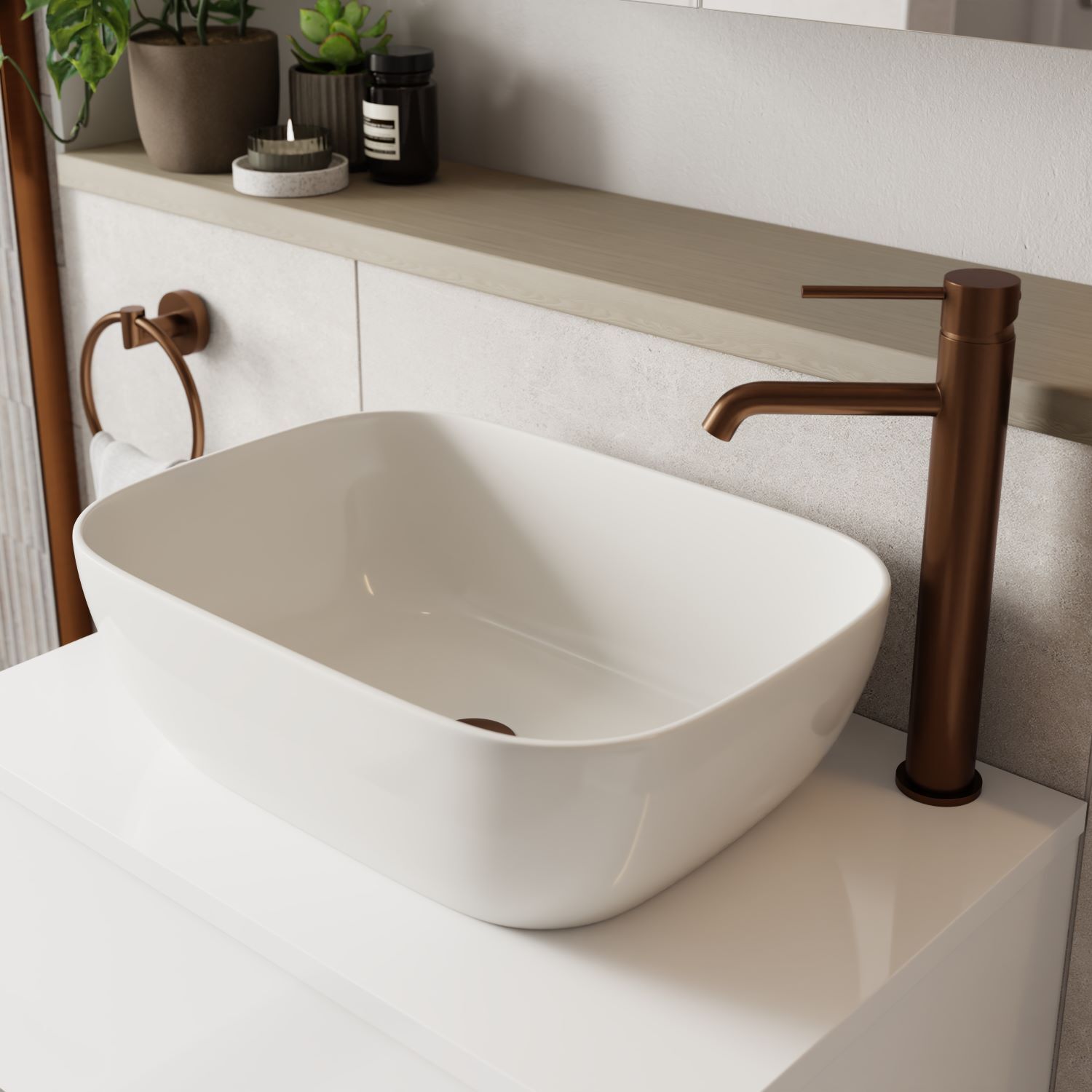brushed bronze high rise tap with white countertop basin
