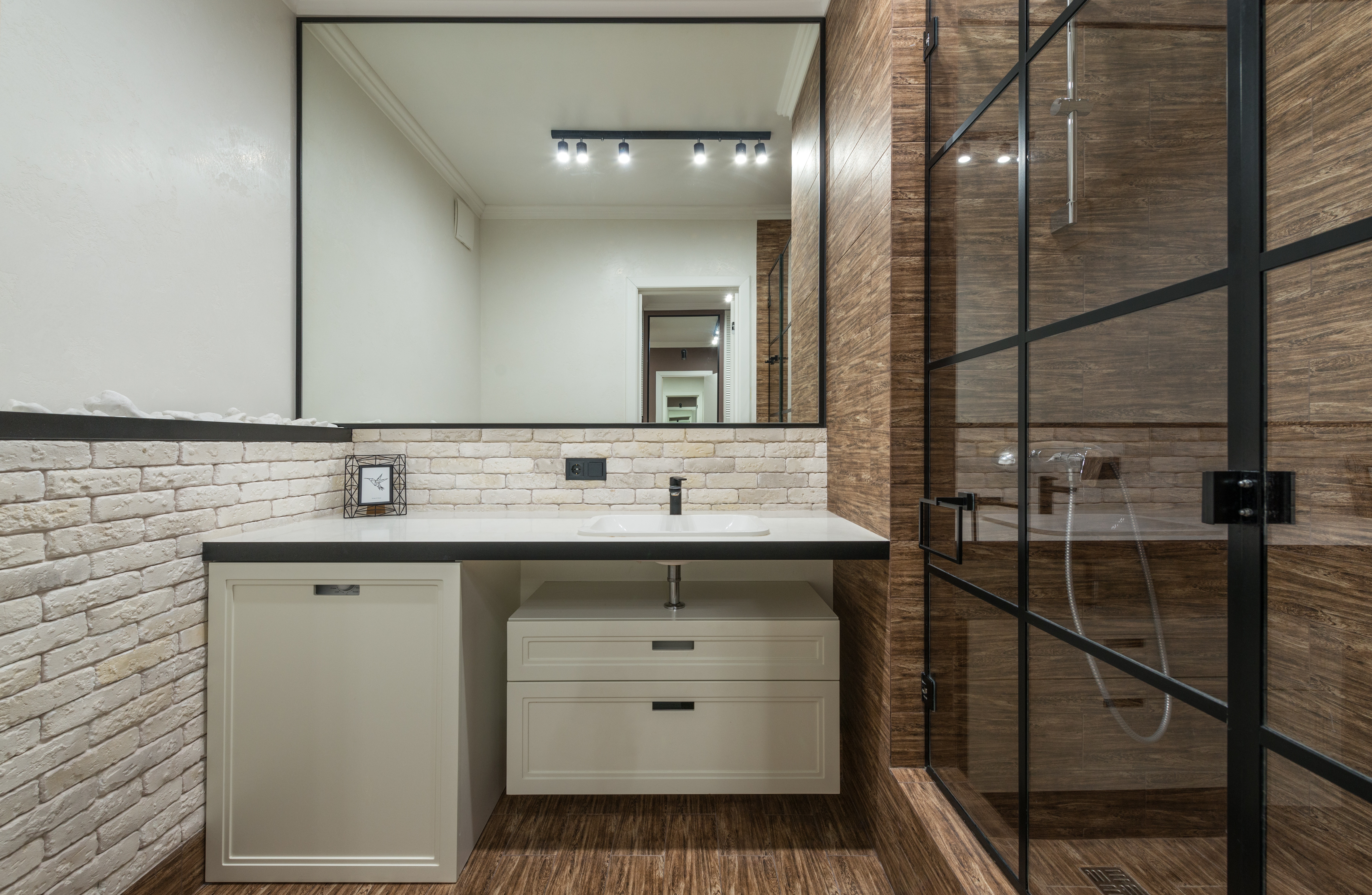 Contemporary stylish bathroom with a walk-in shower enclosure and a basin vanity unit