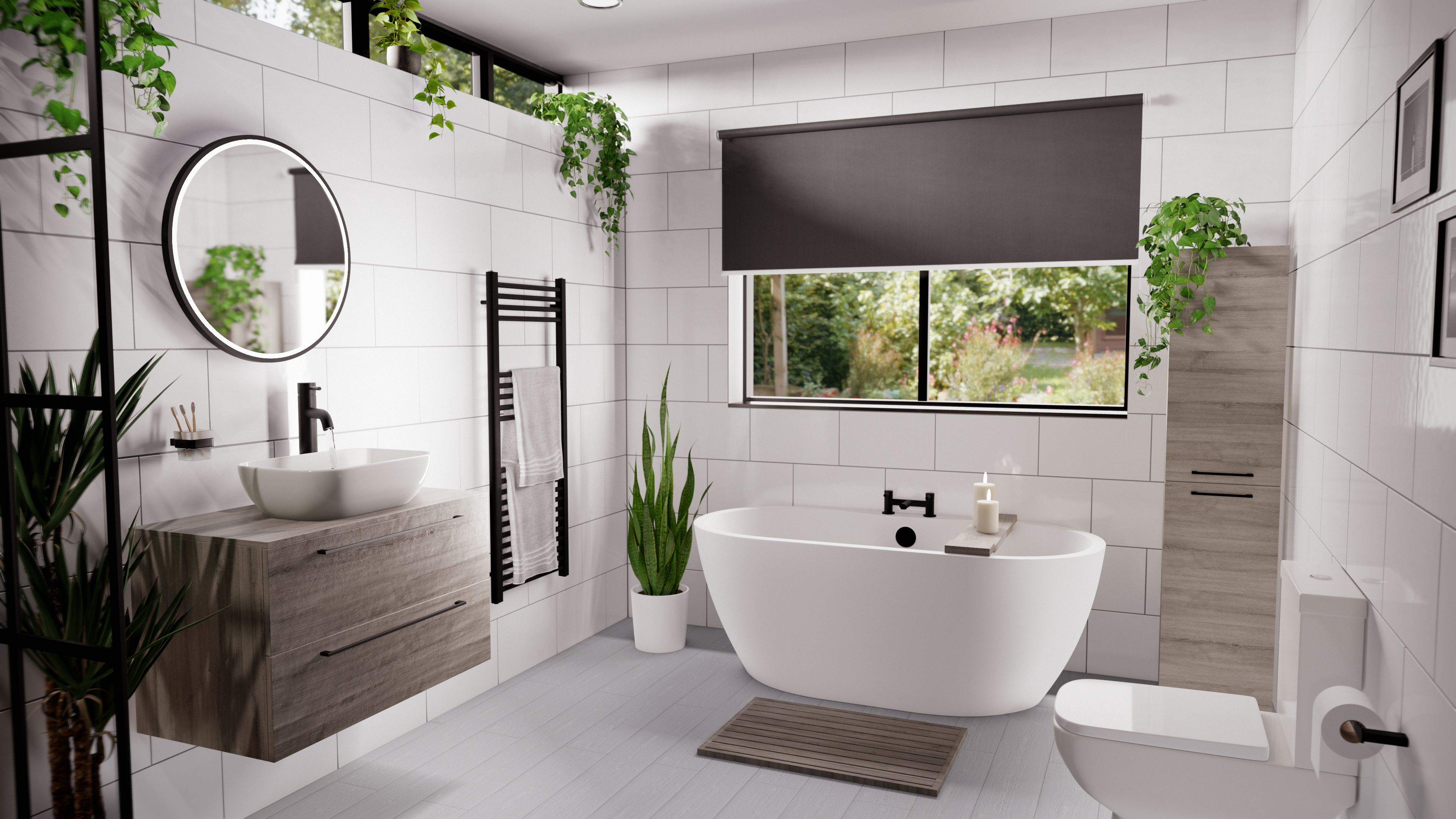 White tiled bathroom with toilet, bath, vanity unit and basin with greenery throughout
