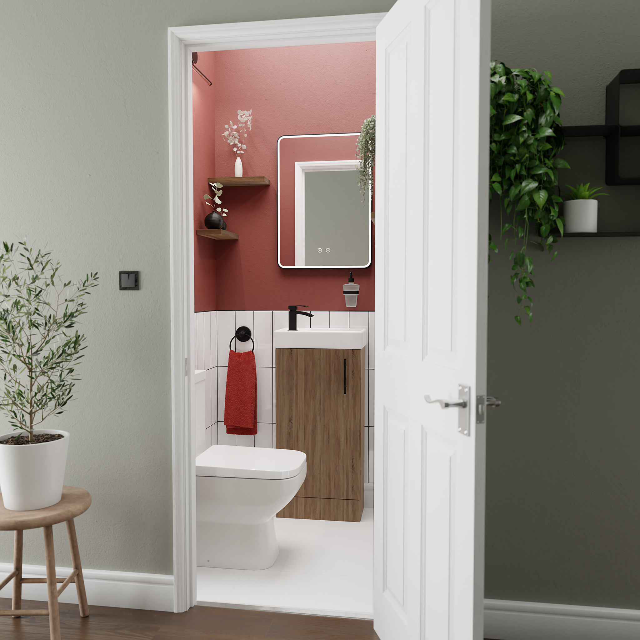 Cloakroom bathroom with compact basin unit and toilet