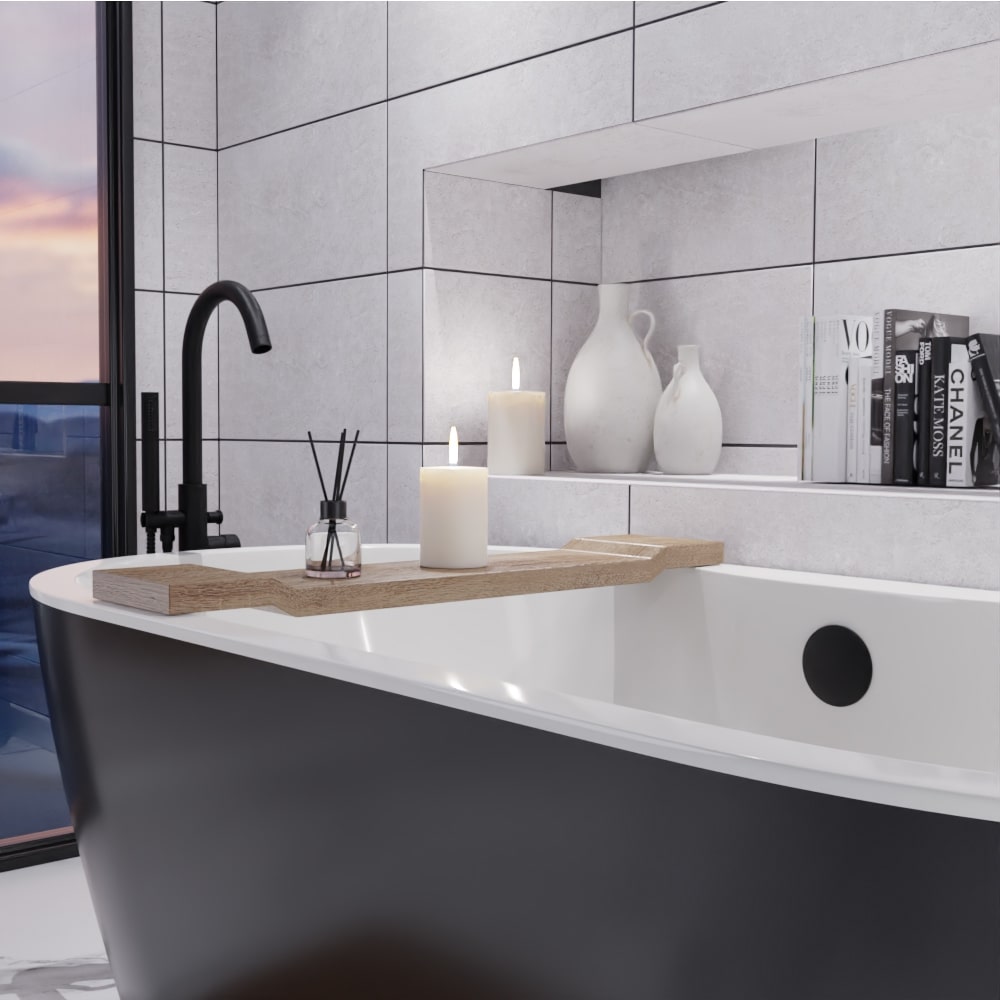 Elegant freestanding matt black bath with matching freestanding bath tap