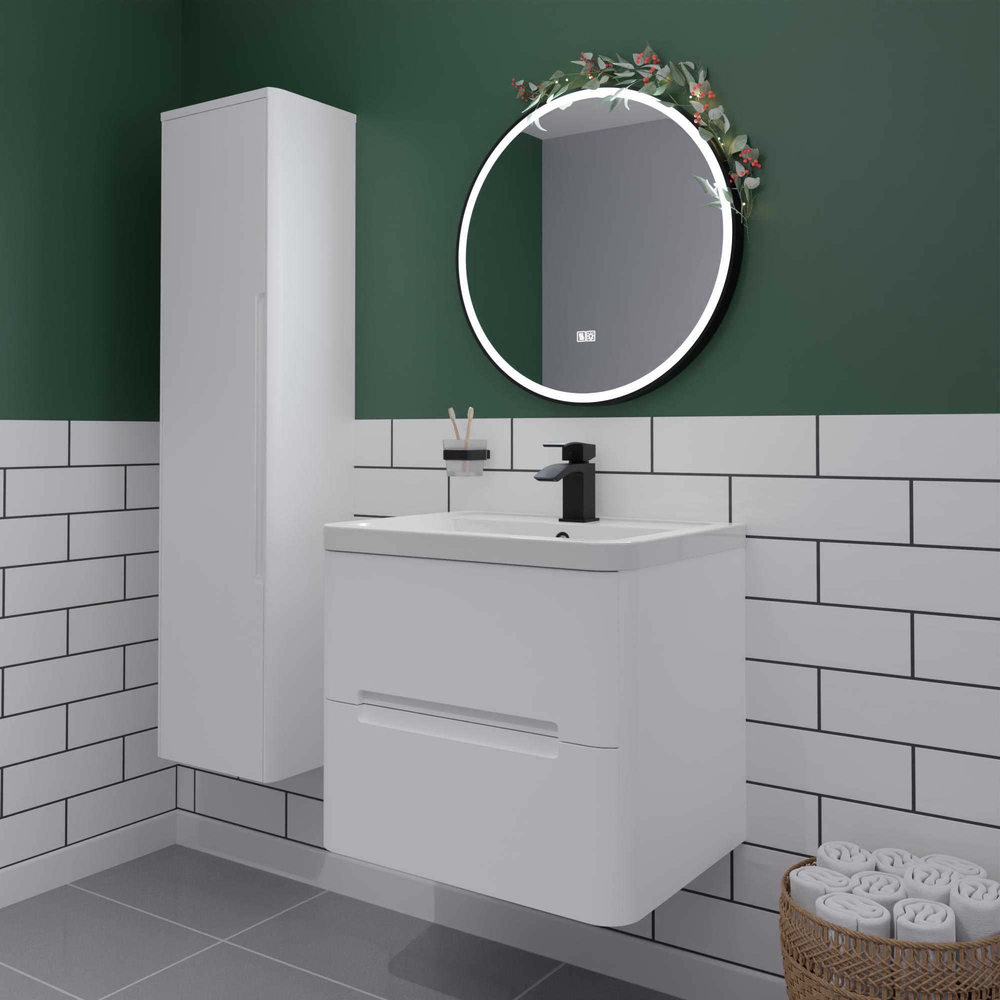 Forest green bathroom with festive foliage around mirror