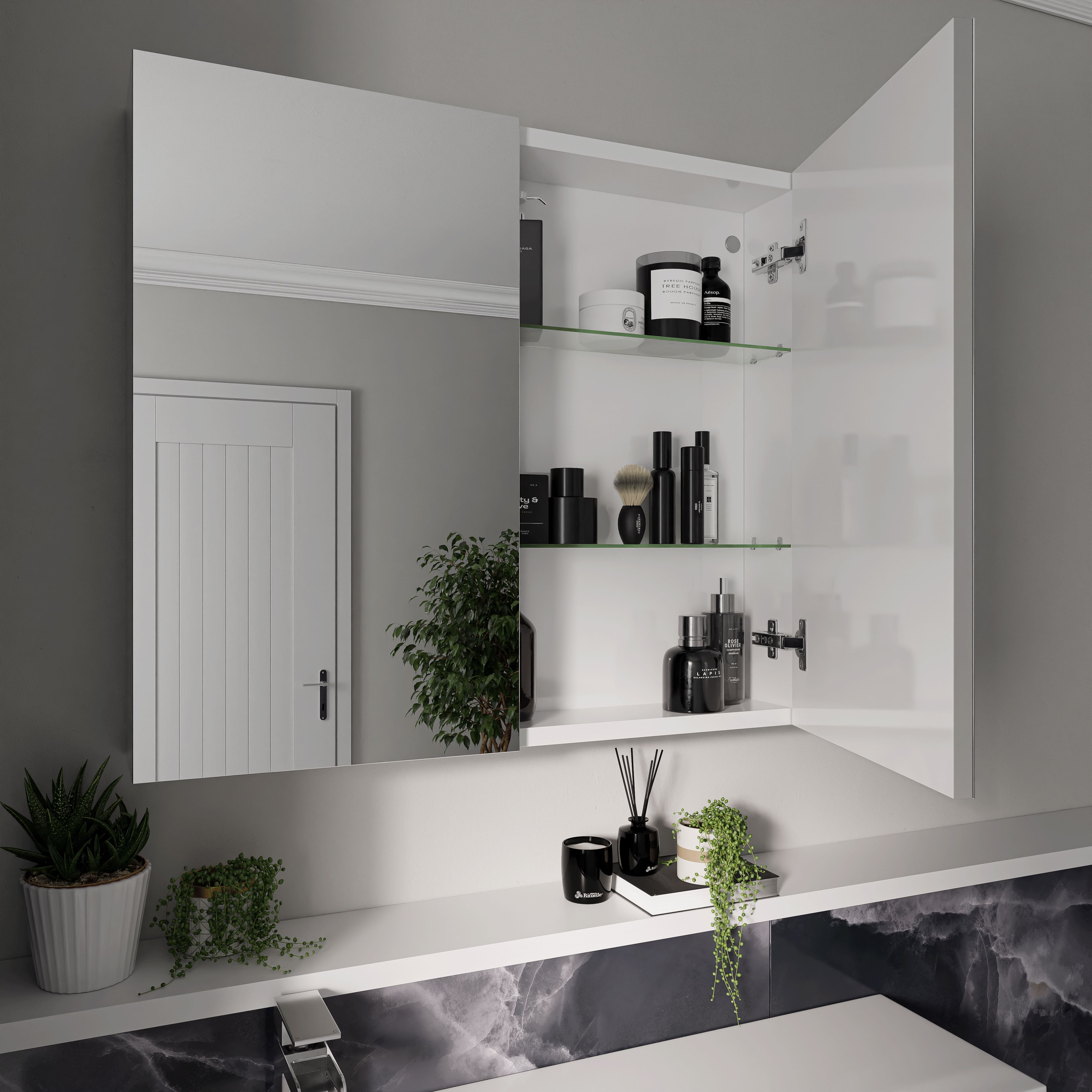 Bathroom wall cabinet with one door open to show products inside