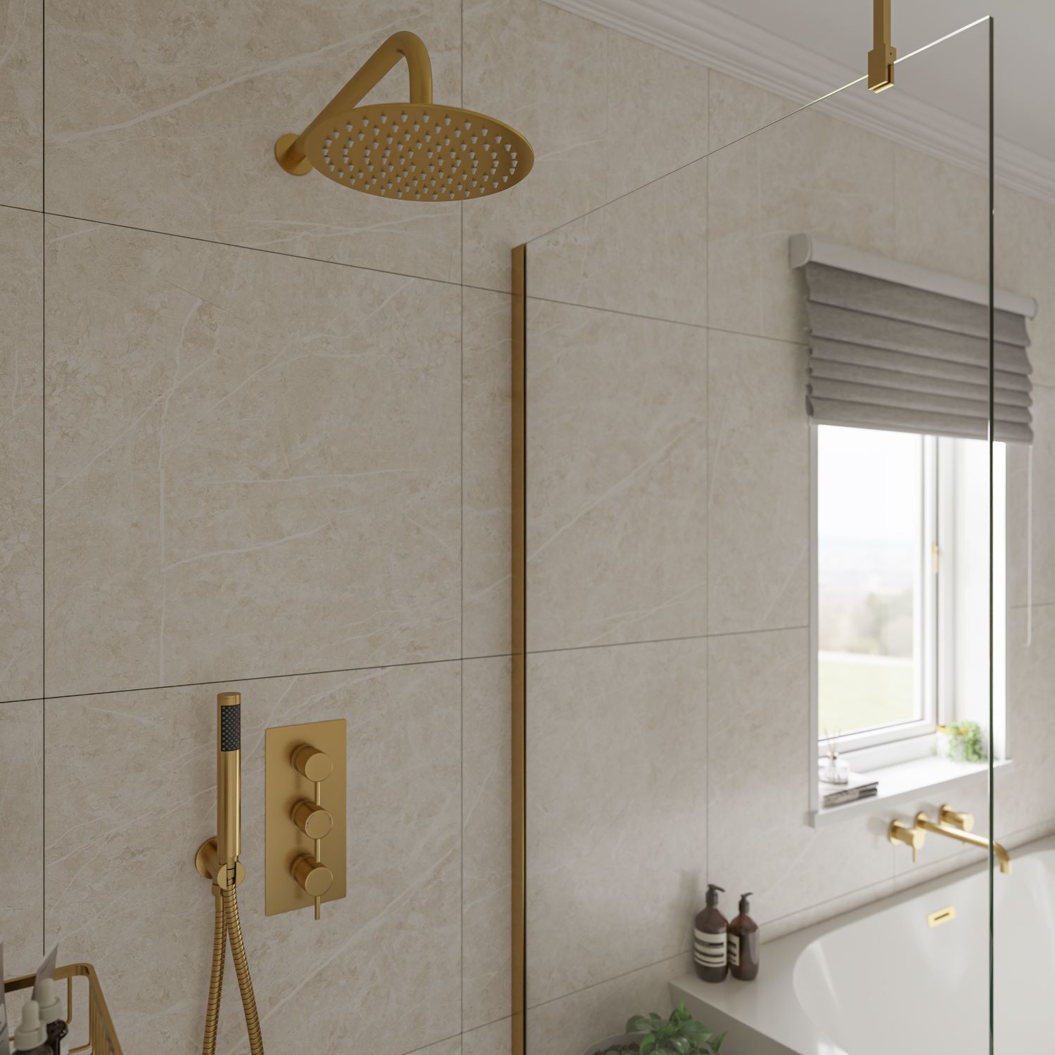 Brushed brass concealed shower against large format tiles with dark grout