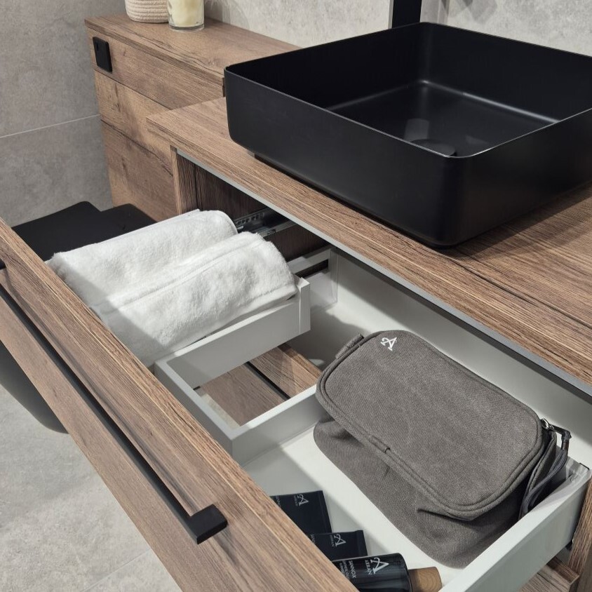 Storage solution ideas, open drawer with towels and toiletries